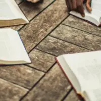 A group reading their Bibles together